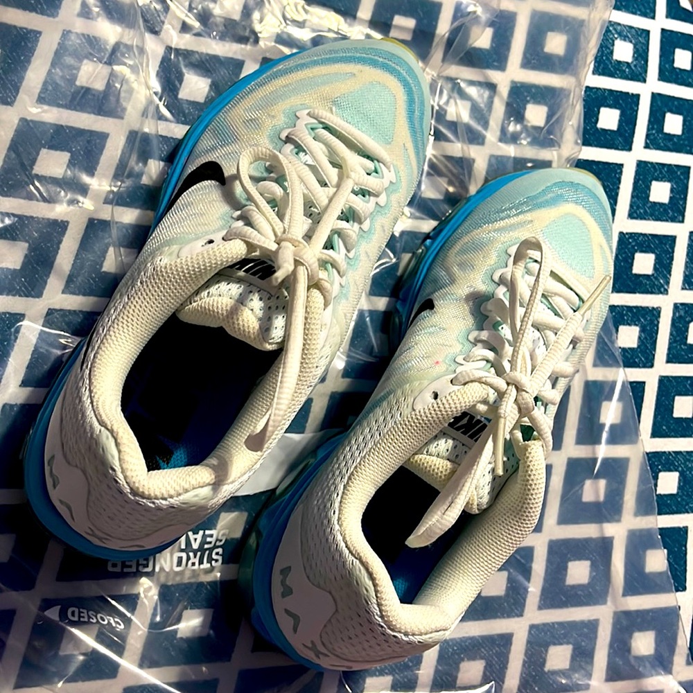 Nike AirMax tailwind 7.  Very gently used , look and feel brand new.